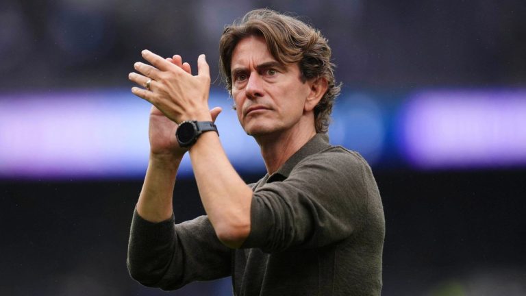 Tottenham Hotspur manager Thomas Frank applauds after the English Premier League soccer match between Tottenham Hotspur and Bournemouth at the Tottenham Hotspur Stadium in London, Saturday, Aug. 30, 2025. (John Walton/PA via AP)