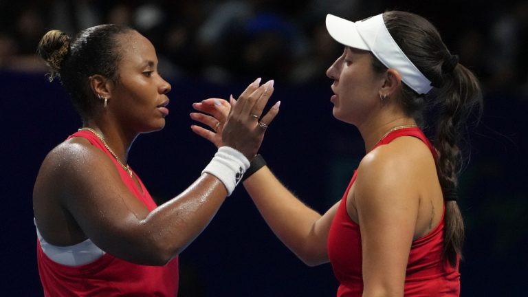 Jessica Pegula and Taylor Townsend, of the United States great each others after defeating Elena Rybakina and Yulia Putintseva, of Kazakhstan in the Billie Jean King Cup quarterfinals tennis doubles match, at the Shenzhen Bay Sports Center Arena, in Shenzhen, China's Guangdong province, Thursday, Sept. 18, 2025. (Andy Wong/AP)