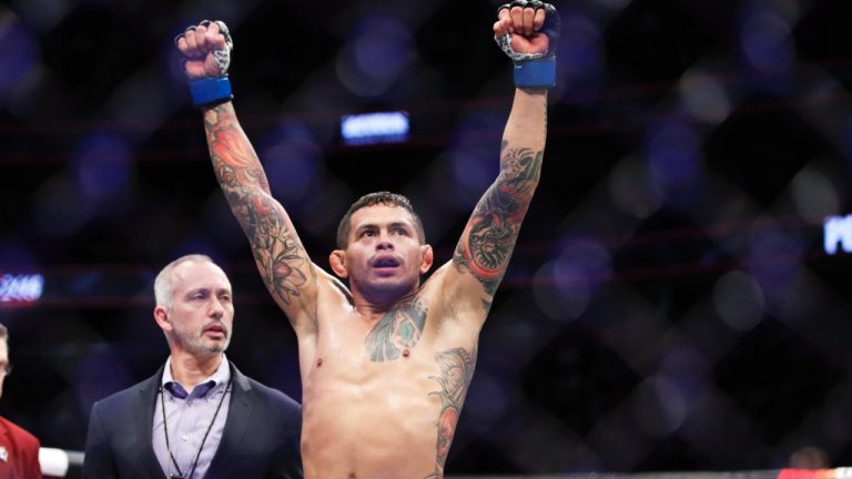 UFC lightweight Diego Ferreira celebrates after winning a fight. (John Locher/AP)