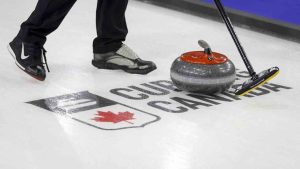 A curling stone passes over a logo during a practice session at the Tim Hortons Brier in Lethbridge, Alta., Friday, March 4, 2022. (Jeff McIntosh/CP)