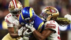 Short-handed 49ers stop Rams on downs in overtime to preserve win