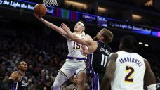 Reaves has career night as Lakers beat Kings without Luka Doncic