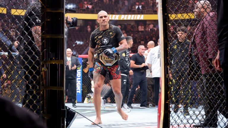 Alex Pereira leaves the Octagon after winning the UFC light-heavyweight championship at UFC 320 in Las Vegas. (Steve Marcus/Las Vegas Sun via AP)