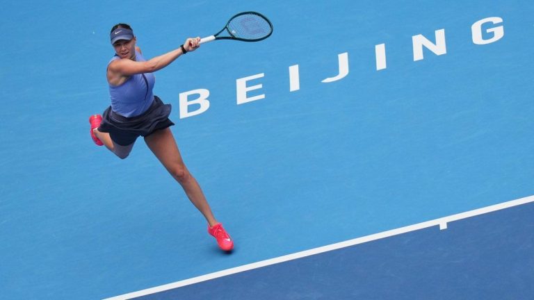 Amanda Anisimova, of the United States plays a forehand return to her compatriot Coco Gauff during the women's singles semifinals match of the China Open tennis tournament, at the National Tennis Center, in Beijing, Saturday, Oct. 4, 2025. (Andy Wong/AP)