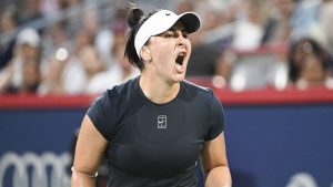 Bianca Andreescu, of Canada, reacts during her first round match against Barbora Krejcikova, of the Czech Republic, at the National Bank Open tennis tournament in Montreal, Sunday, July 27, 2025. (Graham Hughes/CP)
