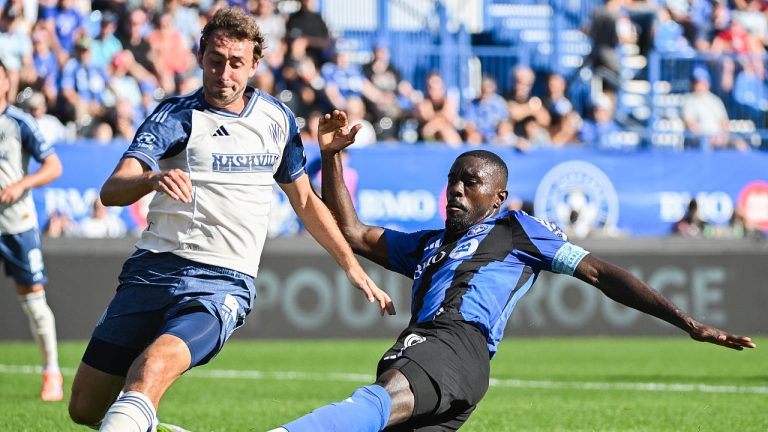 Nashville SC's Jack Maher defends against CF Montreal's Prince Owusu during first half MLS action in Montreal, Saturday, Oct. 4, 2025. (THE CANADIAN PRESS/Graham Hughes)