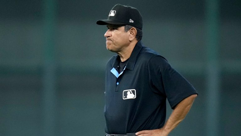 Second base umpire Alfonso Márquez watches play between the Detroit Tigers and Houston Astros in the seventh inning of Game 2 of an AL Wild Card Series baseball game Wednesday, Oct. 2, 2024, in Houston. (Kevin M. Cox/AP)