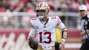 San Francisco 49ers quarterback Brock Purdy runs with the ball during the first half of an NFL game against the Jacksonville Jaguars, Sunday, Sept. 28, 2025, in Santa Clara, Calif. (Godofredo A. Vásquez/AP)