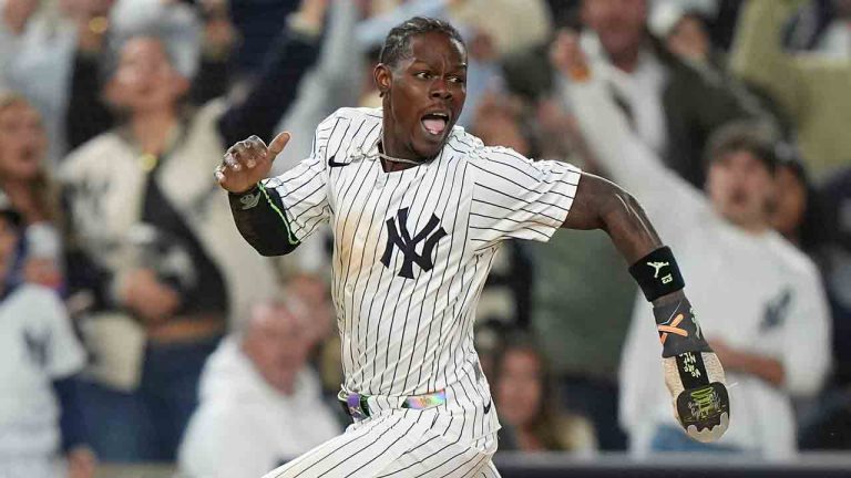 New York Yankees Jazz Chisholm Jr. rounds third base on his way home to score on a base hit by Austin Wells against the Boston Red Sox during the eighth inning of Game 2 of an American League wild-card baseball playoff series, Wednesday, Oct. 1, 2025, in New York. (Frank Franklin II/AP)