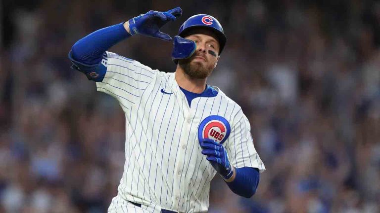 Chicago Cubs' Michael Busch reacts after hitting a home run during the seventh inning of Game 3 of a National League wild card baseball game against the San Diego Padres Thursday, Oct. 2, 2025, in Chicago. (Nam Huh/AP)