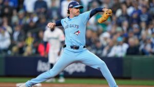 Toronto Blue Jays pitcher Shane Bieber delivers a pitch against the Seattle Mariners during the first inning of Game 3 in the American League Championship Series in Seattle on Wednesday, Oct. 15, 2025. (Frank Gunn/CP)