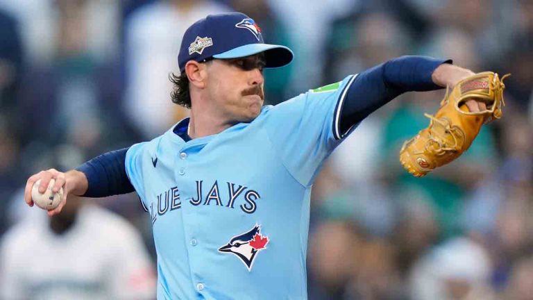 Toronto Blue Jays pitcher Shane Bieber (57) delivers a pitch against the Seattle Mariners during first inning Game 3 American League Championship Series baseball action in Seattle on Wednesday, Oct. 15, 2025. THE CANADIAN PRESS/Frank Gunn