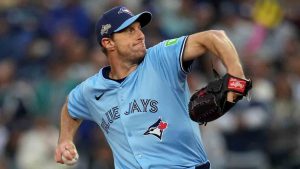Toronto Blue Jays pitcher Max Scherzer throws against the Seattle Mariners during the first inning in Game 4 of baseball's American League Championship Series, Thursday, Oct. 16, 2025, in Seattle. (Abbie Parr/AP)