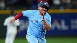 Toronto Blue Jays' Alejandro Kirk rounds the bases to score on a base hit by Ernie Clement during the sixth inning in Game 5 of baseball's American League Championship Series against the Seattle Mariners, Friday, Oct. 17, 2025, in Seattle. (Abbie Parr/AP)