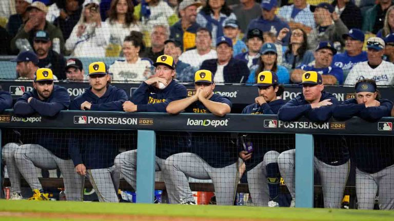 Members of the Milwaukee Brewers watch during the eighth inning in Game 4 of baseball's National League Championship Series against the Los Angeles Dodgers, Friday, Oct. 17, 2025, in Los Angeles. (Ashley Landis/AP)