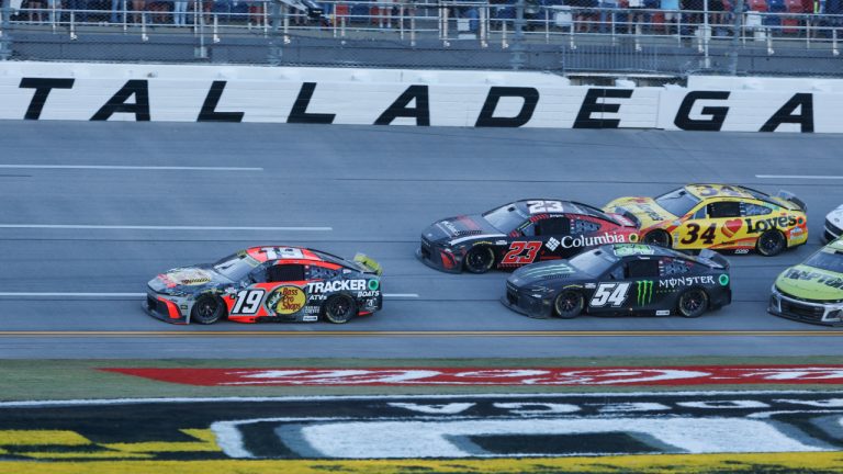 Chase Briscoe leads the pack to the finish line for the win during a NASCAR Cup Series race at Talladega Superspeedway, Sunday, Oct. 19, 2025, in Talladega, Ala. (Butch Dill/AP)