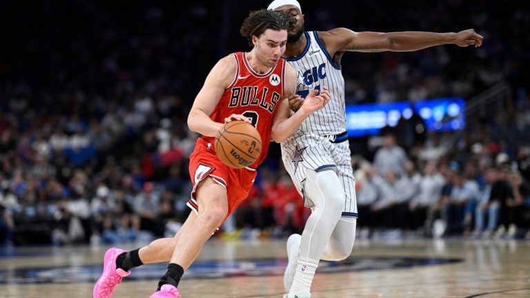 Chicago Bulls guard Josh Giddey drives past Orlando Magic center Wendell Carter Jr. during the first half of an NBA game, Saturday, Oct. 25, 2025, in Orlando, Fla. (Phelan M. Ebenhack/AP)