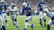Taylor runs for three TDs, Jones throws for two as Colts rout Raiders