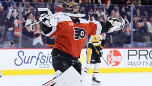 Philadelphia Flyers' Samuel Ersson reacts after the Flyers won an NHL hockey game against the Pittsburgh Penguins in a shootout, Tuesday, Oct. 28, 2025, in Philadelphia. (Matt Slocum/AP)