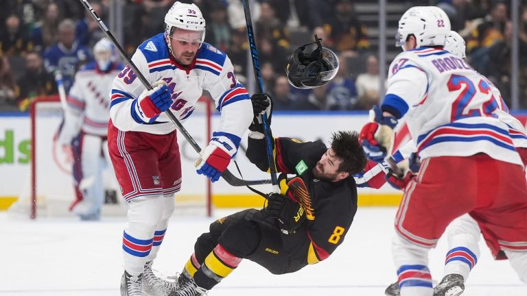 Canucks forward Conor Garland exits vs. Rangers - Sportsnet.ca