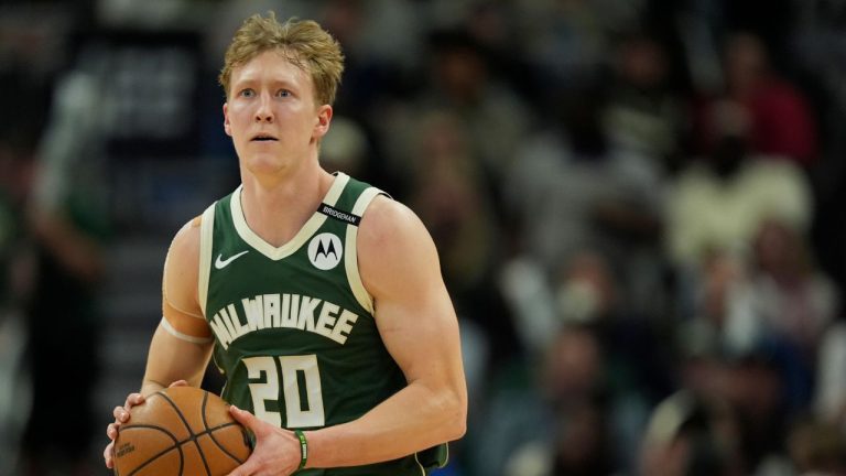 Milwaukee Bucks' AJ Green secures a pass during the first half of an NBA basketball game against the Minnesota Timberwolves, Tuesday, April 8, 2025, in Milwaukee. (Aaron Gash/AP)
