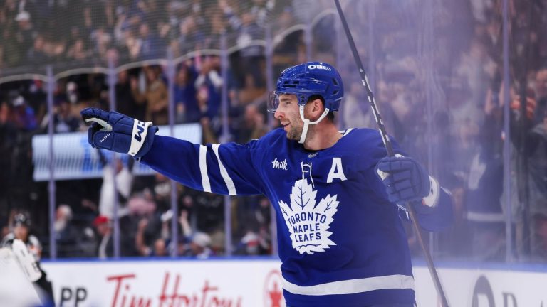 Toronto Maple Leafs centre John Tavares (91) celebrates his overtime game-winning goal against the Buffalo Sabres during NHL hockey action in Toronto on Saturday, October 25, 2025. (Nick Iwanyshyn/CP)