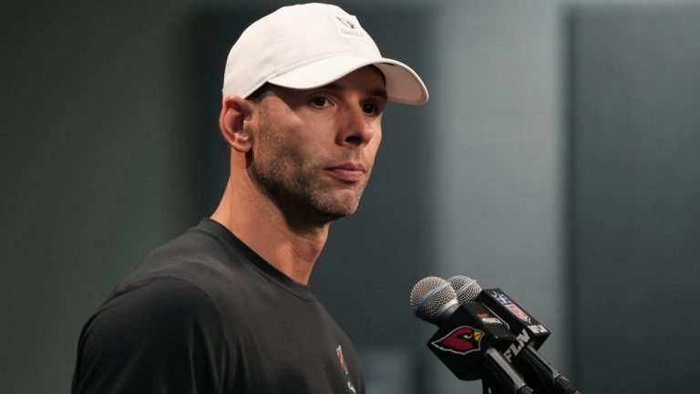 Arizona Cardinals head coach Jonathan Gannon pauses before answering a question during a news conference after an NFL football game against the Tennessee Titans Sunday, Oct. 5, 2025, in Glendale, Ariz. (AP Photo/Rick Scuteri)