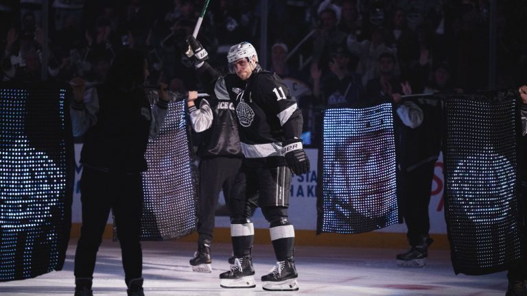 Los Angeles Kings center Anze Kopitar (11) is introduced before an NHL hockey game against Colorado Avalanche, Tuesday, Oct. 7, 2025, in Los Angeles. (AP Photo/Kyusung Gong)