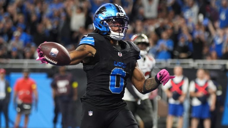 Detroit Lions running back Jammer Gibbs (0) celebrates his touchdown against the Tampa Bay Buccaneers during the second half of an NFL football game, Monday, Oct. 20, 2025, in Detroit. AP Photo/Ryan Sun)