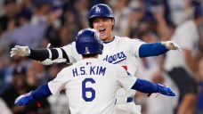 Dodgers eliminate Phillies after Kerkering’s wild throw in extras