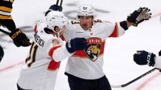 Marchand has two assists to help Panthers win in emotional return to Boston