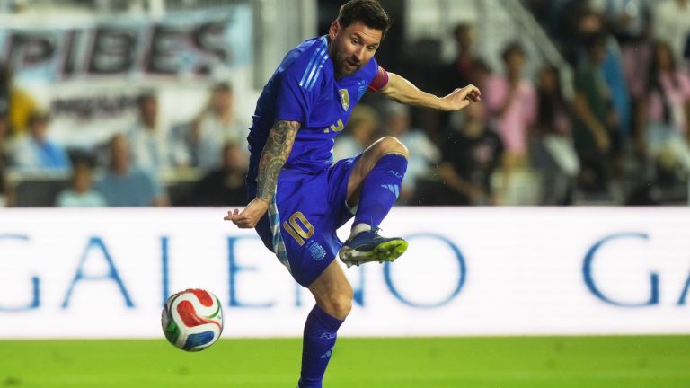 Argentina's Lionel Messi (10) attempts a shot on goal during the first half of a friendly soccer match against Puerto Rico, Tuesday, Oct. 14, 2025, in Fort Lauderdale, Fla. (AP Photo/Marta Lavandier)