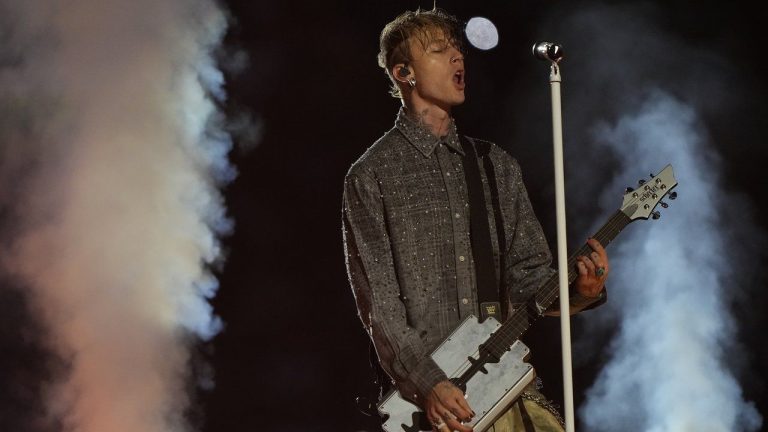 mgk performs at halftime during an NFL football game between the Carolina Panthers and the New York Giants at Allianz Arena in Munich, Germany, Sunday, Nov. 10, 2024. (Steve Luciano/AP)