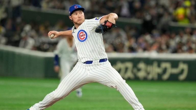 Chicago Cubs pitcher Nate Pearson works against the Hanshin Tigers during the seventh inning of a spring training baseball game in Tokyo, Saturday, March 15, 2025. (Eugene Hoshiko/AP)