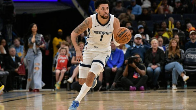 Memphis Grizzlies guard Scotty Pippen Jr. (1) brings the ball up court in the first half of an NBA basketball preseason game against the Detroit Pistons Monday, Oct. 6, 2025, in Memphis, Tenn. (Brandon Dill/AP)