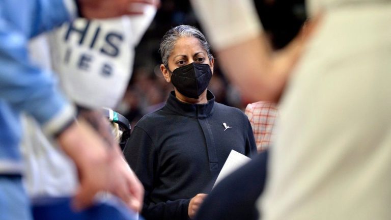 Memphis Grizzlies assistant coach Sonia Raman stands in a huddle in the first half of an NBA basketball game against the Dallas Mavericks on Jan. 14, 2022, in Memphis, Tenn. (Brandon Dill/AP)