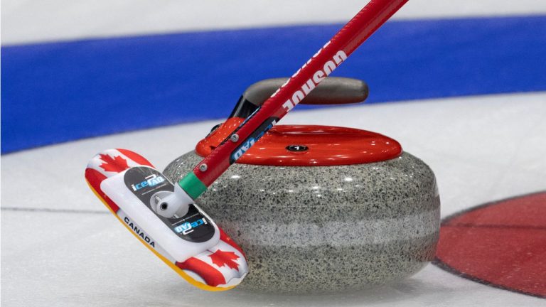 Canada skip Brad Gushue slows a rock during a practice session at the World Curling Championship, March 31, 2023 in Ottawa. (Adrian Wyld/ CP)