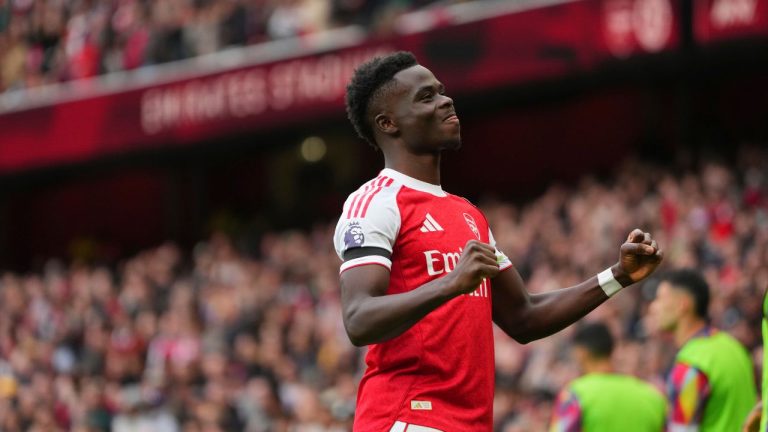 Arsenal's Bukayo Saka celebrates after scoring his side's second goal during the English Premier League soccer match between Arsenal and West Ham United at the Emirates stadium in London, Saturday, Oct. 4, 2025. (Kirsty Wigglesworth/AP)
