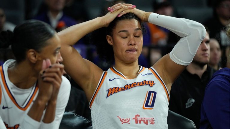 Phoenix Mercury forward Satou Sabally (0) sits on the bench during the second half in Game 2 of the WNBA basketball finals against the Las Vegas Aces, Sunday, Oct. 5, 2025, in Las Vegas. (John Locher/AP)