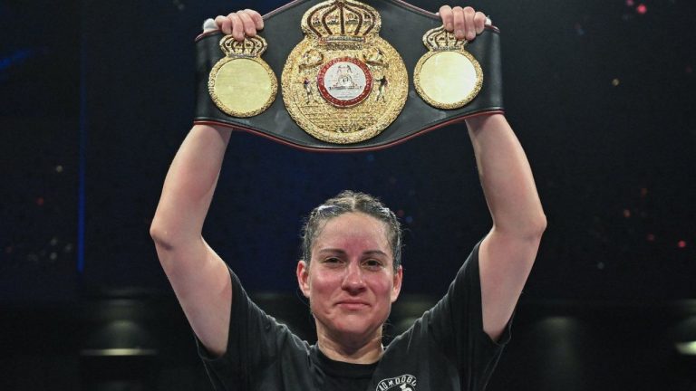 Mary Spencer holds up the belt following her victory over Ogleidis Suarez in their WBA World Super Welterweight Championship fight in Montreal, Thursday, April 10, 2025. (Graham Hughes/CP)