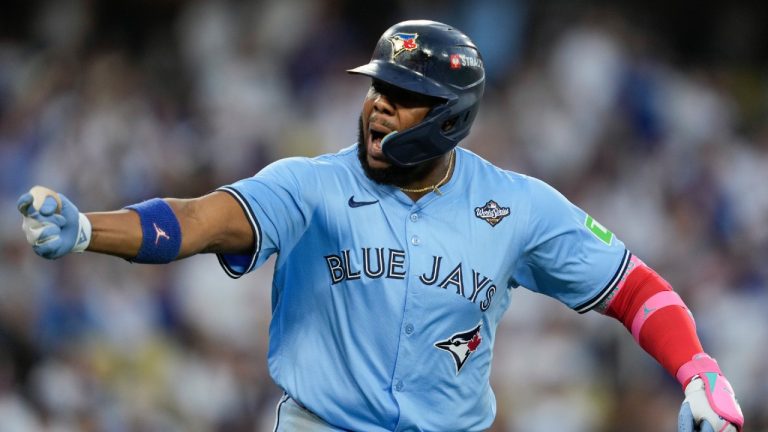 Toronto Blue Jays' Vladimir Guerrero Jr. points to his dugout after hitting a two run against the Los Angeles Dodgers during the third inning in Game 4 of baseball's World Series, Tuesday, Oct. 28, 2025, in Los Angeles. (Ashley Landis/AP)