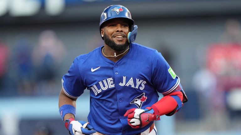 Toronto Blue Jays first baseman Vladimir Guerrero Jr. (27) rounds the bases after hitting a grand slam during fourth inning MLB American League Division Series baseball action against the New York Yankees, in Toronto, Sunday, Oct. 5, 2025. (Nathan Denette/CP)