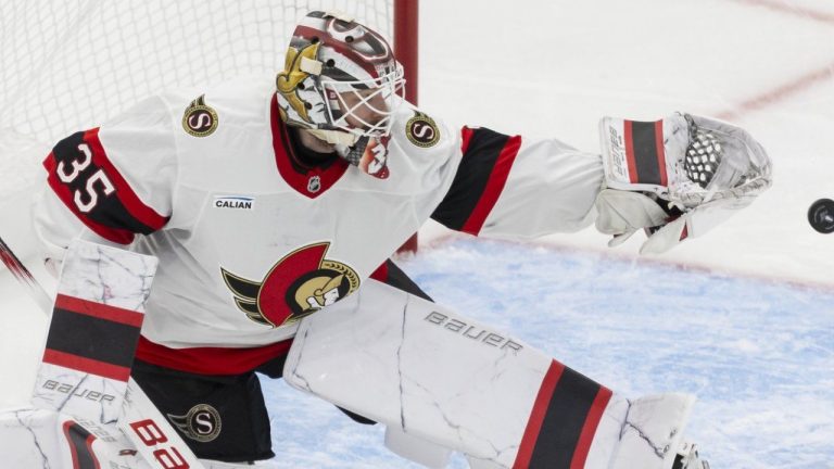 Ottawa Senators' goaltender Linus Ullmark tips a Toronto Maple Leafs shot with his glove during third period NHL playoff action in Toronto on Sunday, April 20, 2025. (THE CANADIAN PRESS/Nick Iwanyshyn)