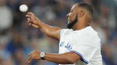 Edwin Encarnacion throws first pitch before Game 1 of ALCS