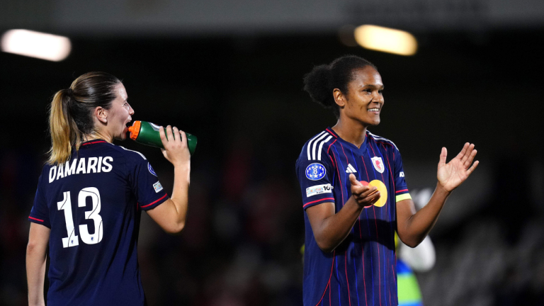 OL Lyonnes' Wendie Renard applauds the fans following the Women's Champions League soccer match between Arsenal and OL Lyonnes at Meadow Park, Borehamwood, England, Tuesday, Oct, 7, 2025. (John Walton/PA via AP)