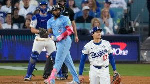 Los Angeles Dodgers pitcher Shohei Ohtani watches Toronto Blue Jays' Vladimir Guerrero Jr.'s two-run home take flight during the third inning in Game 4 of baseball's World Series, Tuesday, Oct. 28, 2025, in Los Angeles. (David J. Phillip/AP)