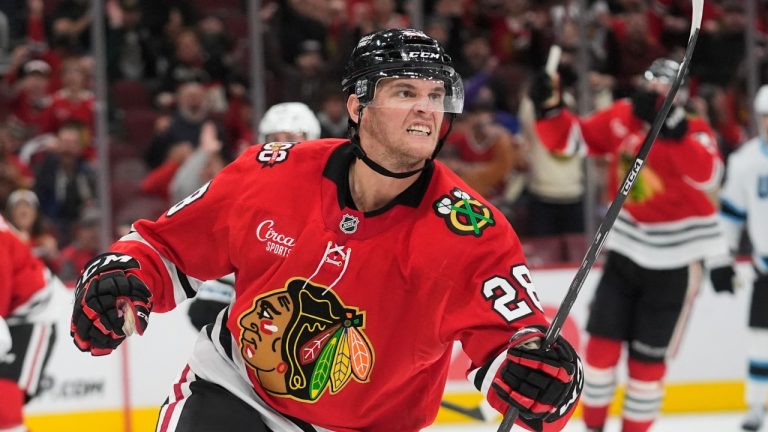 Chicago Blackhawks left wing Andre Burakovsky (28) celebrates after scoring against Utah Mammoth goaltender Vitek Vanecek during the third period of an NHL hockey game Monday, Oct. 13, 2025, in Chicago. (Erin Hooley/AP)