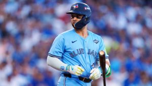 Toronto Blue Jays designated hitter Bo Bichette (11) walks against the Los Angeles Dodgers during first inning Game 4 World Series playoff MLB baseball action in Los Angeles on Tuesday, Oct. 28, 2025. (Frank Gunn/CP)