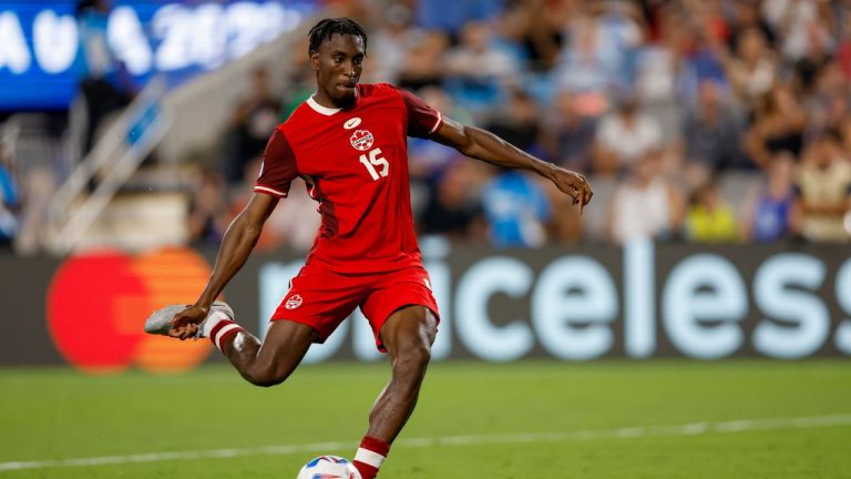 Canada defender Moïse Bombito shoots in a penalty shootout the Copa America third place soccer match against Uruguay in Charlotte, N.C., Saturday, July 13, 2024. (Nell Redmond/AP)