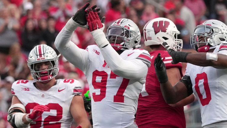 Ohio State's Kenyatta Jackson Jr. reacts after sacking Wisconsin quarterback Danny O'Neil during the second half of an NCAA college football game Saturday, Oct. 18, 2025, in Madison, Wis. (Morry Gash/AP Photo)